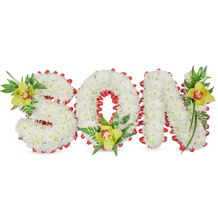 A carefully composed funeral tribute forming the word SON, rendered in dense, sculpted letters of snow-white chrysanthemum blooms that give each character a plush, tactile surface. The arrangement is set against an uncluttered white backdrop so the crispness of the petals and the precision of the florist's technique are the focus. Tracing the outline of each letter is a dramatic band of red ribbon, expertly folded into small scalloped loops that frame the white flowers and continue into the O's central void, creating a striking graphic contrast that reads as both honour and affection. Placed at three focal points are lime-green Cymbidium orchids-one on the S, one cradled at the bottom of the O, and one on the upper stroke of the N-with pale orange to reddish-brown markings in their throats; their firm, wax-like petals introduce a sculptural, luminous quality against the softer chrysanthemum texture. Sprays of glossy greenery and delicate fern fronds weave around the orchids, lending movement and a sense of living growth to a piece intended for remembrance. The lighting is gentle and even, emphasising texture over gloss so the composition feels calm and respectful. As a local arrangement familiar to customers who visit New Covent Garden Market and the flower traders around Nine Elms Lane, this tribute suits chapel displays, graveside placements, or memorial services in Battersea and adjacent wards, offering a personalised expression of loss and love created with steady, experienced hands.